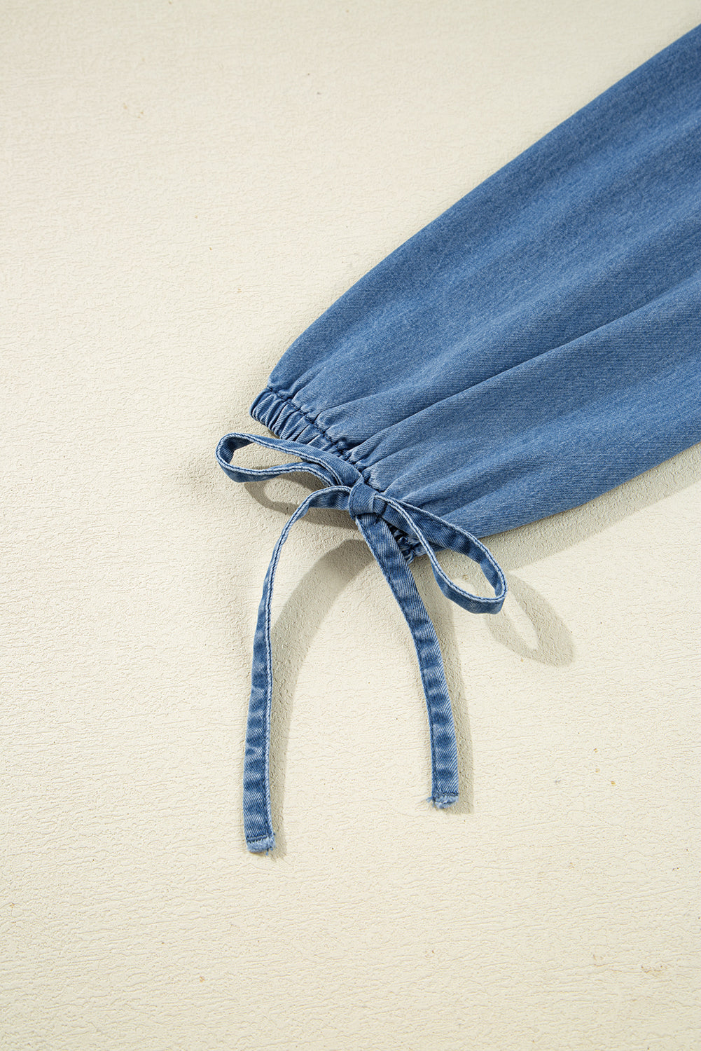 Deidra Blue Denim Lapel Neck Balloon Sleeve Tied Peplum Top