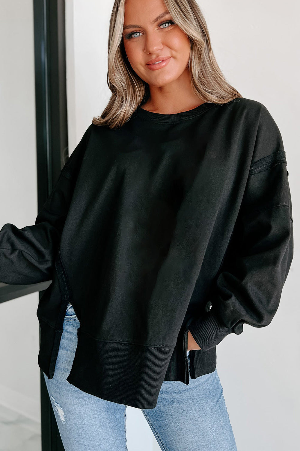 Black Exposed Seam Drop Shoulder Side Slit Sweatshirt