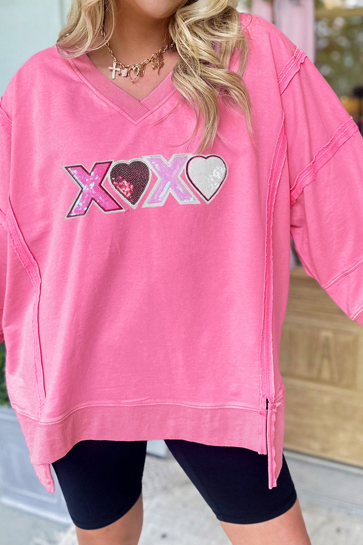 Bonbon Raw Seam Detail XOXO Sequin Patched Graphic V Neck 3/4 Sleeve Top